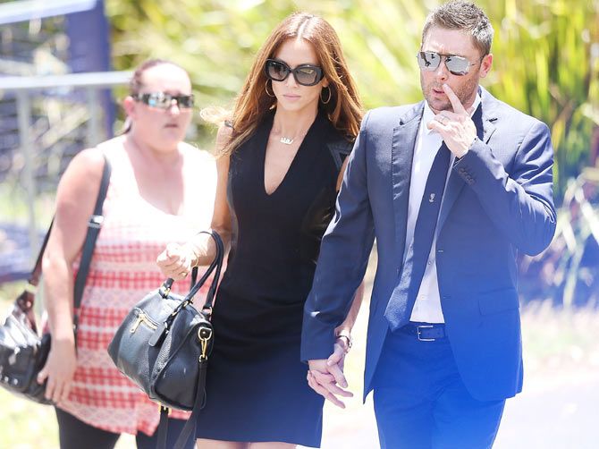 Australian cricket Captain Michael Clarke arrives with wife Kyly Clarke during the Funeral Service for Phillip Hughes