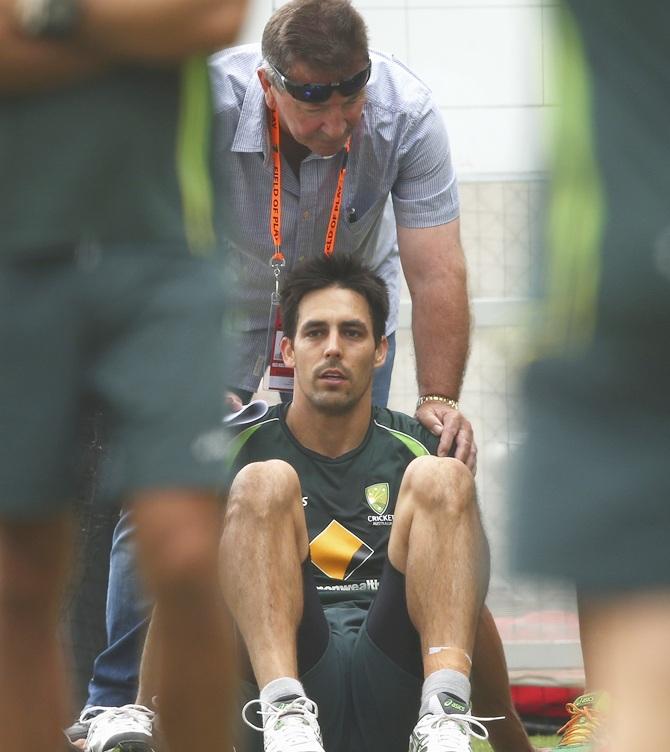 Mitchell Johnson of Australia speaks with Rod Marsh, Australian Chairman of Selectors