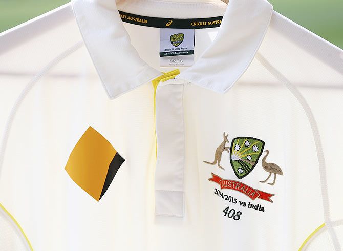 The Test shirt of Michael Clarke of Australia is seen displaying 408, the Test Cap number of   the late Phillip Hughes