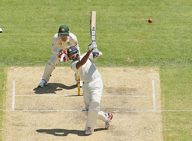 Murali Vijay of India hits a six on Day 3 of the first Test at Adelaide Oval on Thursday