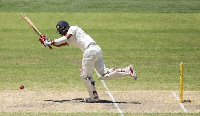 Cheteshwar Pujara of India bats