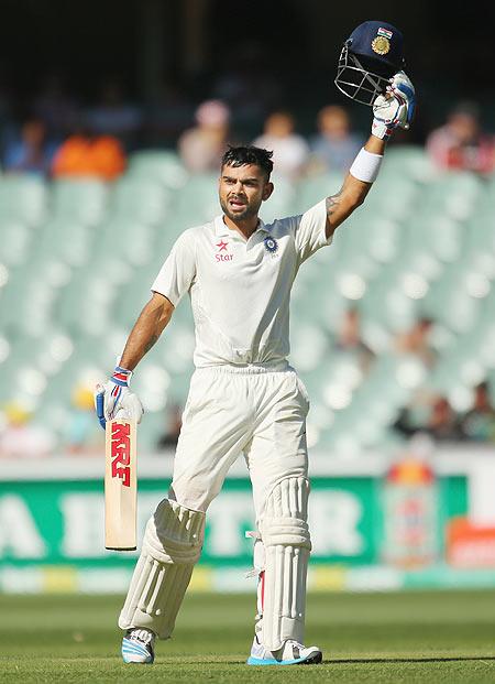 India captain Virat Kohli celebrates on completing his century on Thursday