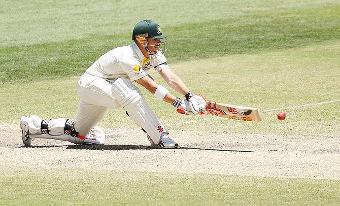 David Warner bats during Day 4 in the first Test between Australia and India at the Adelaide Oval