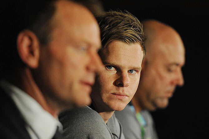 Steve Smith looks on during a press conference at The Gabba on Monday