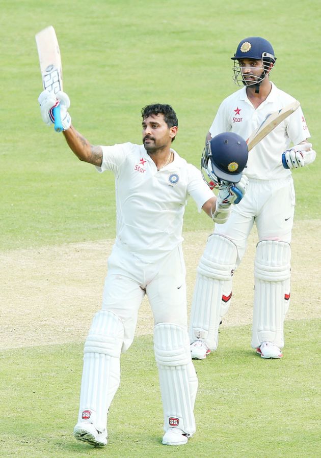 Murali Vijay of India celebrates his century against Australia on Day 1 of the 2nd Test at The Gabba on Wednesday