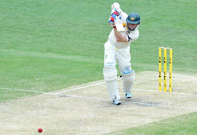 Chris Rogers plays a shot on the off-side at the Gabba on Thursday