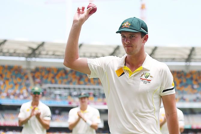 Josh Hazlewood of Australia leaves the field after taking five wickets on Day 2 of the 2nd Test between Australia and India at The Gabba in Brisbane on Thursday