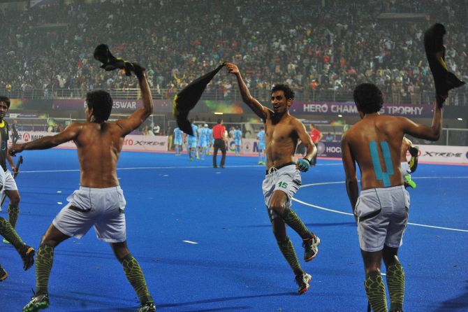 Pakistani players celebrate after winning the Champions Trophy semi-final game against India