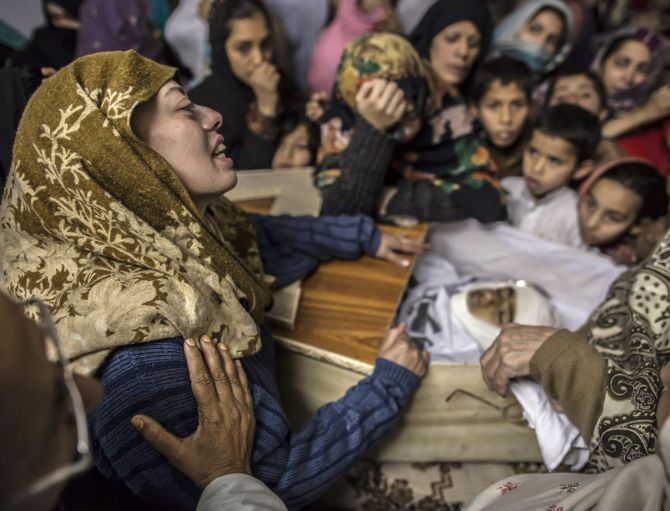 A mother mourns her son who was killed during the attack on the Army Public School in Peshawar. Photograph: Zohra Bensemra/Reuters