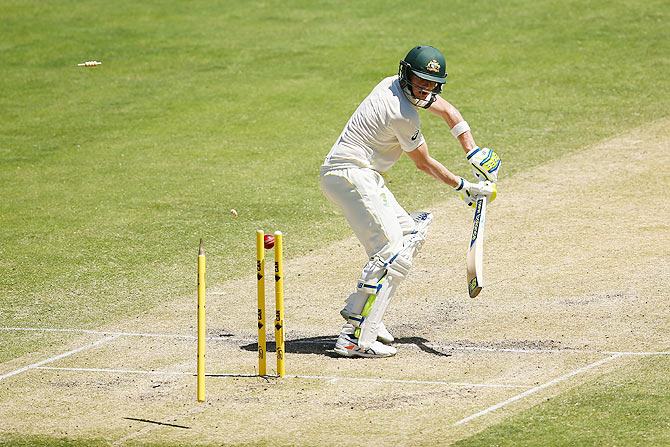 Australian captain Steve Smith is bowled by Ishant Sharma of India during day three 