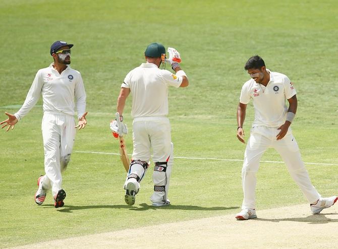 Umesh Yadav of India celebrates