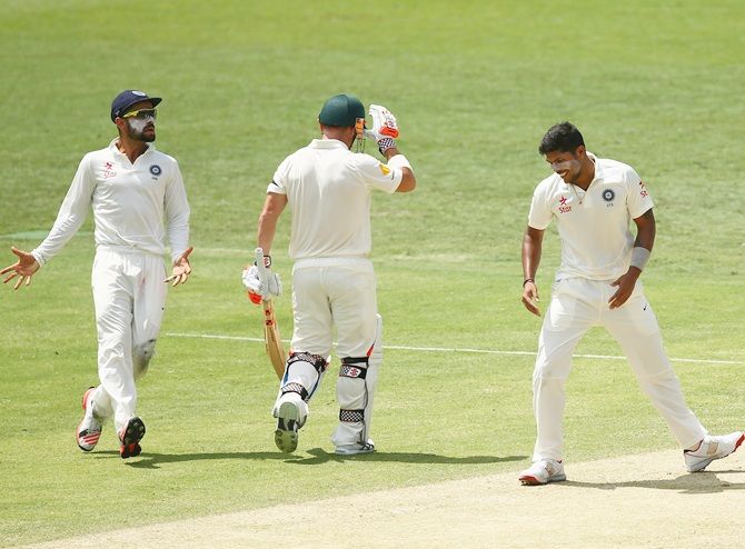 Umesh Yadav celebrates after picking a wicket