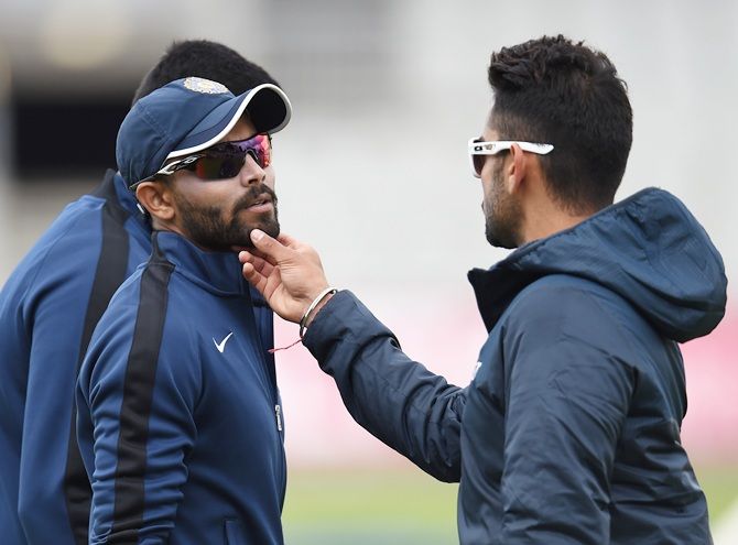 India batsman Ravindra Jadeja and Virat Kholi share a joke
