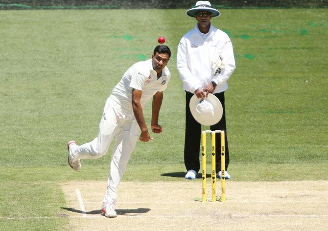 Off-spinner Ravichandran in action.