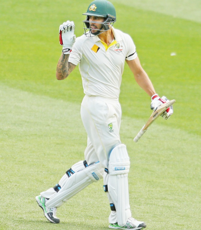 Mitchell Johnson of Australia reacts