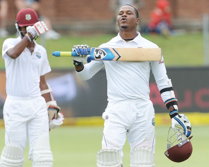 Marlon Samuels celebrates his century on Day 4 of the 2nd Test against South Africa at St. Georges Park in Port Elizabeth on Monday