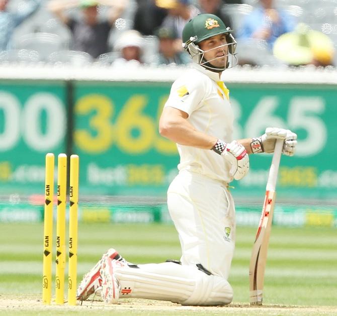 Shaun Marsh of Australia looks on 