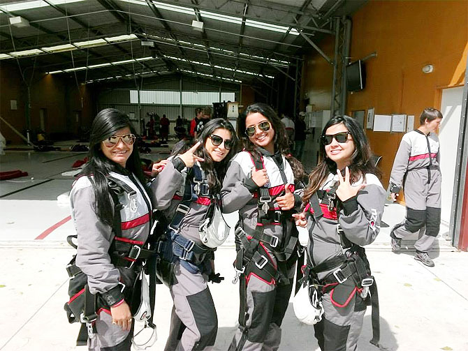 Sakshi Dhoni (right), Puja Pujara, Preethi Lakshminarayanan before going skydive