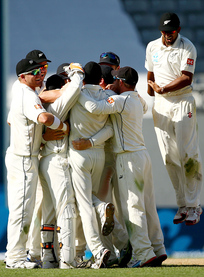 New Zealand celebrate the wicket of Ishant Sharma to win the first Test at Eden Park in Auckland on Sunday