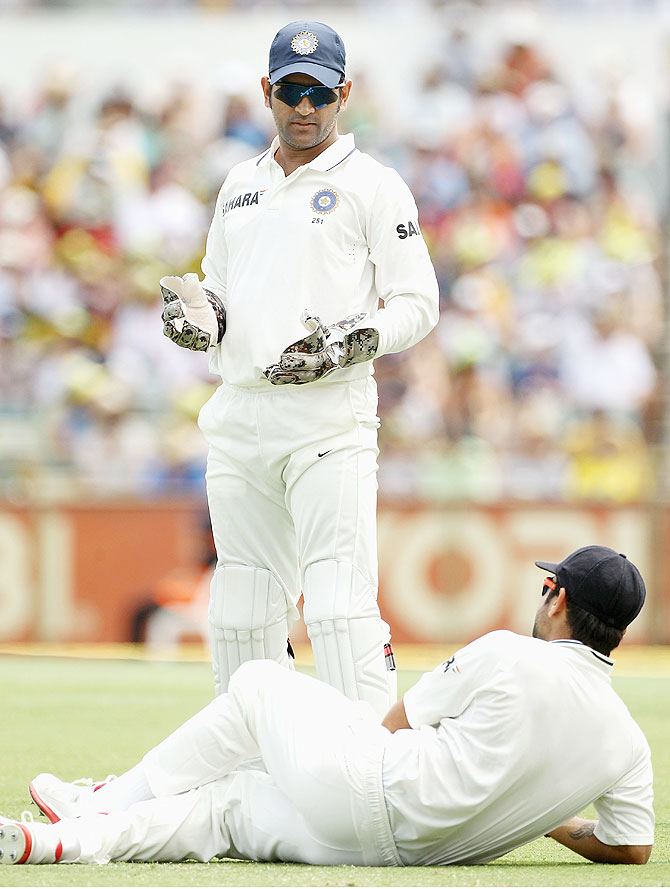Will Virat Kohli, right, be Dhoni's successor as Test skipper?