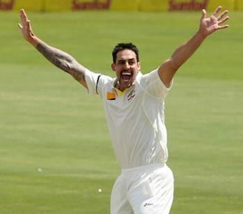 Mitchell Johnson celebrates after dismissing Graeme Smith