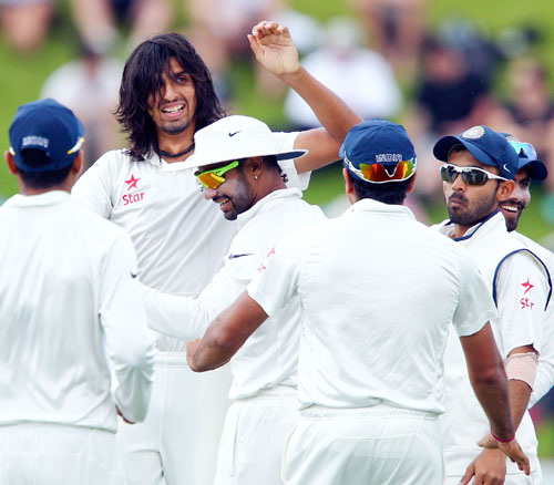 Ishant Sharma celebrates after taking the wicket of Peter Fulton