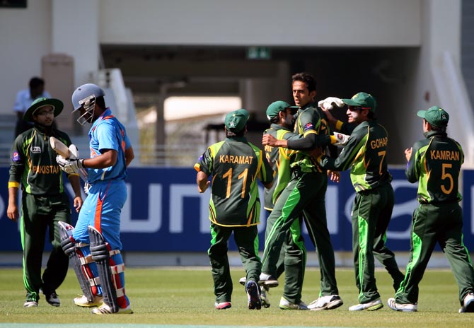 Pakistan's players celebrate a wicket