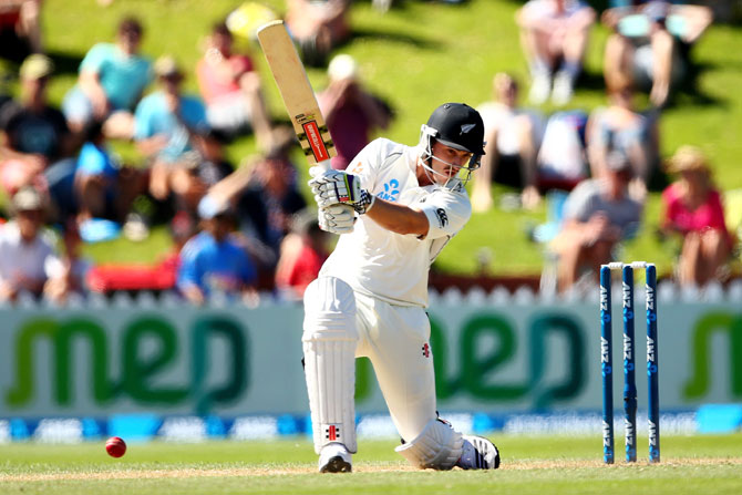 Hamish Rutherford of New Zealand bats during day three