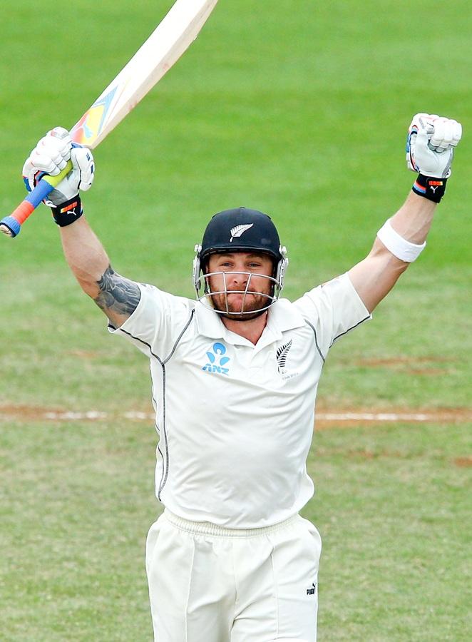 Brendon McCullum of New Zealand celebrates after reaching 300 runs.