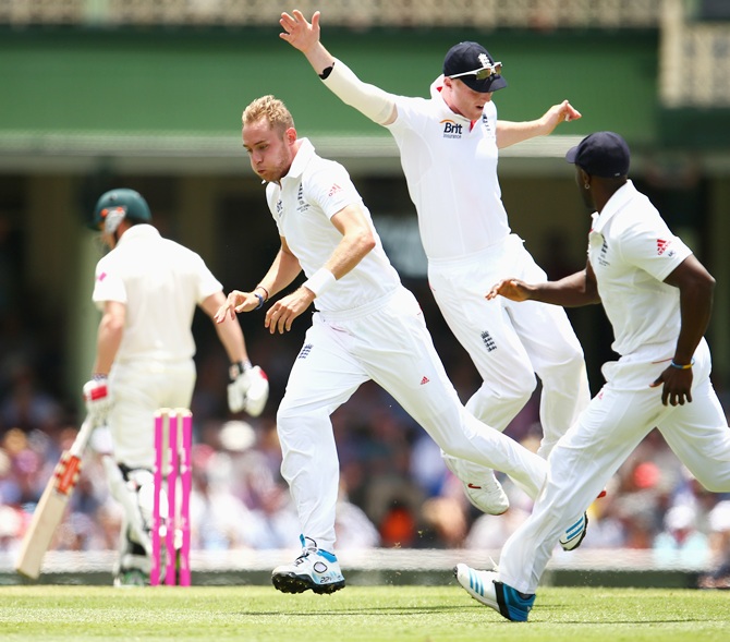 Stuart Broad celebrates after taking the wicket of George Bailey