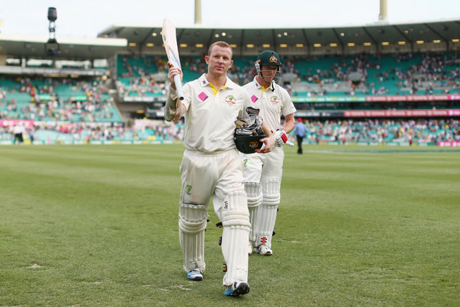 Chris Rogers of Australia acknowledges the crowd at the conclusion of play during day two