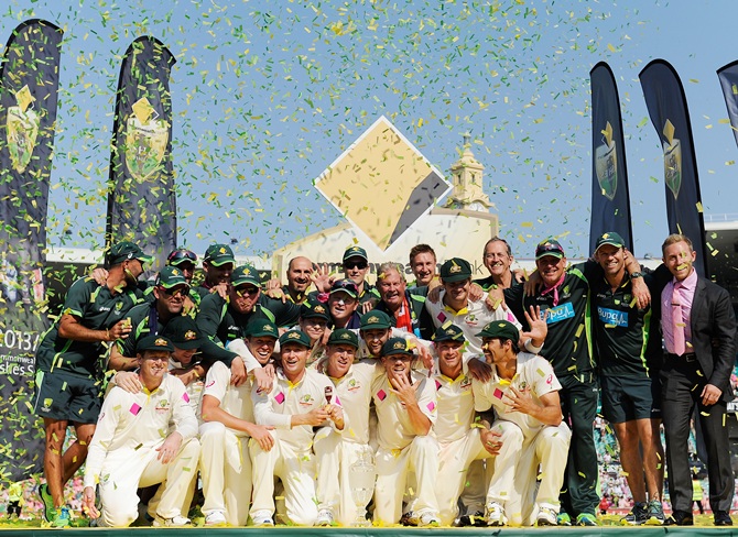 The Australian team celebrates after winning the Ashes series on Sunday