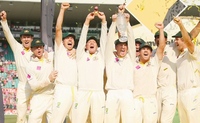 The Australian team celebrate with the after winning the fifth Ashes Test