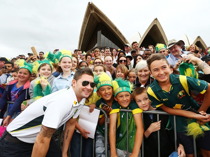 Michael Clarke poses with the cheering fans