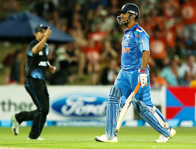 MS Dhoni of India leaves the field after being dismissed during the first One Day International match against New Zealand at McLean Park in Napier on Sunday
