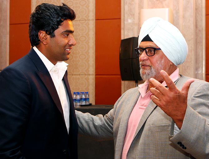 Bishan Singh Bedi (right) chats with Ravichandran Ashwin