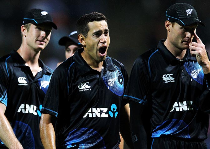 Ross Taylor (centre) celebrates with his team mates after winning the second ODI in Hamilton
