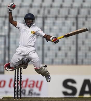 Kaushal Silva celebrates after scoring his maiden Test hundred