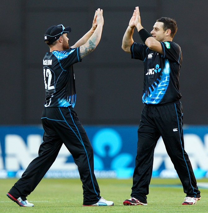 Brendon McCullum (left) and Nathan McCullum of New Zealand celebrate