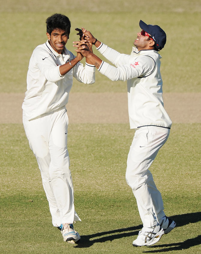 Jasprit Bumrah (left) of India 'A' celebrates after claiming the wicket of Peter Forrest of Australia 'A'
