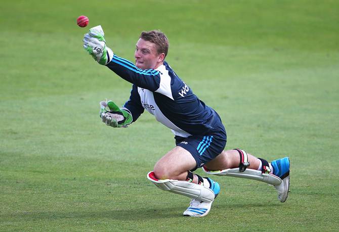 England's Jos Buttler is put through a wicketkeeping drill ahead of the first Investec Test at Trent Bridge