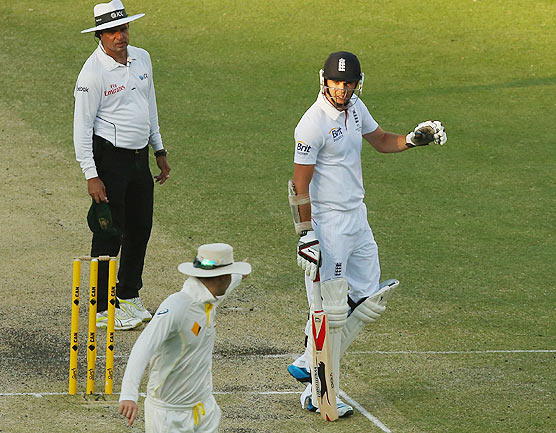 Michael Clarke and James Anderson exchange words