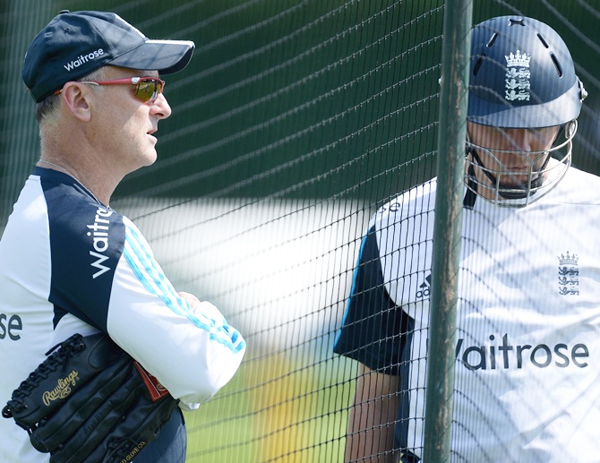 England batting coach Graham Thorpe speaks with Gary Ballance during a training session