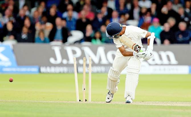 Rahul Dravid of the MCC looks back as he is bowled by Paul Collingwood of Rest of the World during the MCC and Rest of the World match at Lord's Cricket Ground on July 5, 2014