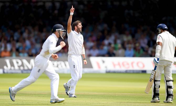 England bowler Liam Plunkett celebrates after dismissing Murali Vijay 