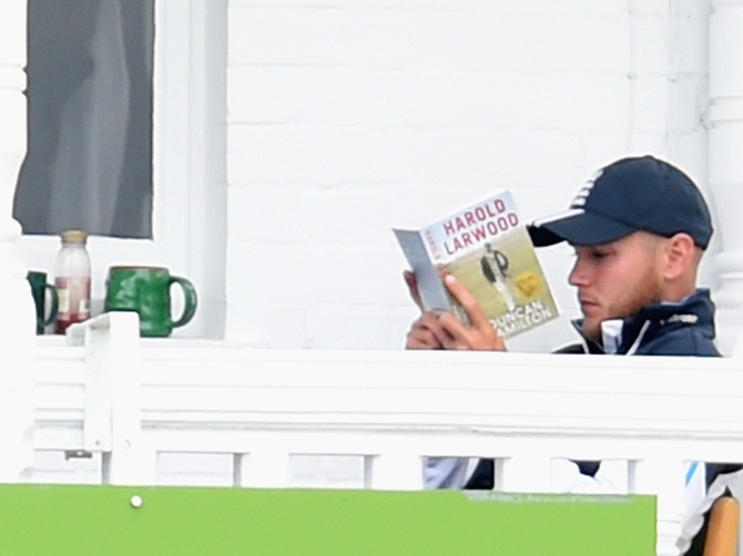 England bowler Stuart Broad settles down to a brew and tucks into a good book