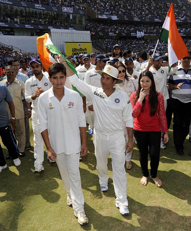 Sachin Tendulkar with son Arjun and daughter Sara after his 200th and final Test at the Wankhede stadium last October.