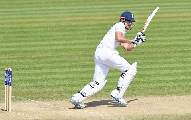 Alastair Cook scores a run during Day 4