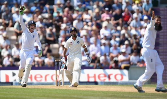 England bowler Moeen Ali and wicketkeeper Jos Buttler appeal in vain for the wicket of India batsman Ajinkya Rahane