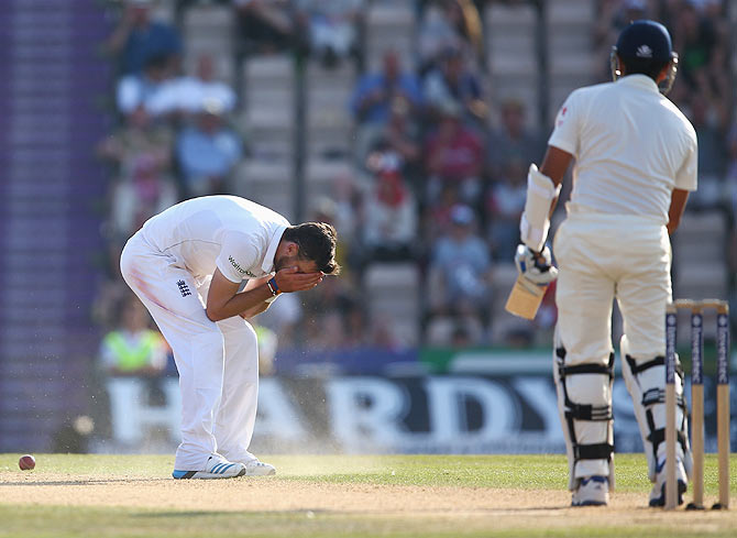 James Anderson reacts after dropping Rohit Sharma off his own bowling on day four of the 3rd Test match on Wednesday